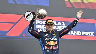 Max Verstappen returns to winners enclosure in Japan