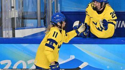Undefeated Sweden beats Japan at women's hockey worlds, clinches playoff spot