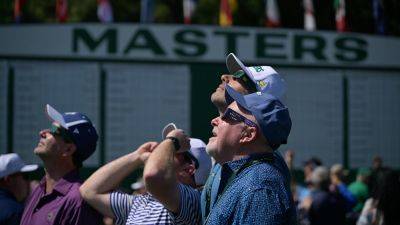 Solar eclipse takes over the Masters as golfers and fans alike soak it in - foxnews.com - Usa - state Georgia - county Warren