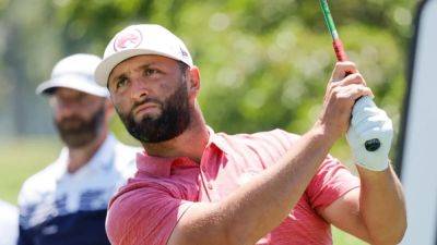Rahm gets morning start to Masters title defence