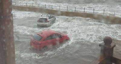 Staff at seafront café rescued by lifeboat after road flooded - manchestereveningnews.co.uk