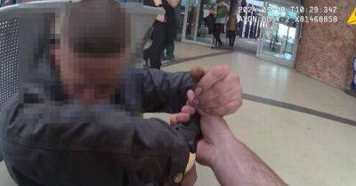 Town centre shops go on LOCKDOWN as cops hunt down 'gang armed with machete' - manchestereveningnews.co.uk