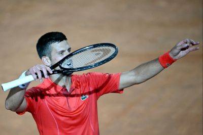 Rafael Nadal - Carlos Alcaraz - Novak Djokovic - Corentin Moutet - Alejandro Tabilo - Djokovic ‘fine’ after bottle strike drama at Rome Open - guardian.ng - France - Serbia - Italy - Chile