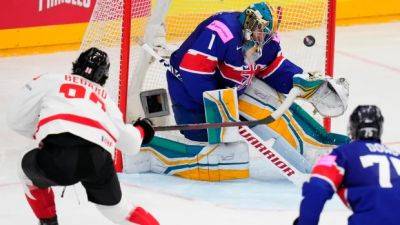 Brandon Hagel - Connor Bedard - Connor Bedard scores pair in hockey worlds debut to lead Canada past Great Britain - cbc.ca - Britain - Germany - Canada - Czech Republic