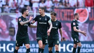 Benjamin Sesko - Seiwald's own goal helps Bremen snatch 1-1 draw at Leipzig - channelnewsasia.com - Germany
