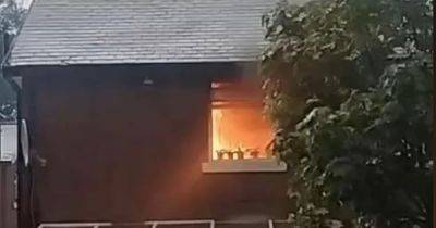 ‘We saw a big ball of white lightning and then my neighbour's house went up in flames’ - manchestereveningnews.co.uk