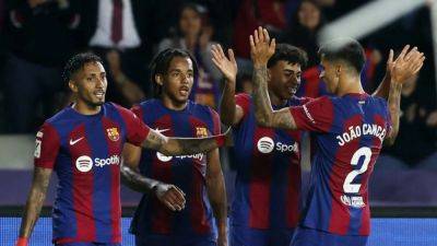 Inigo Martinez - Ilkay Gundogan - Barcelona reclaim second spot with 2-0 win over Real Sociedad - channelnewsasia.com