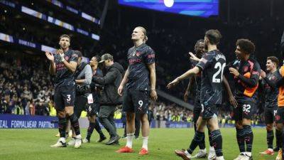 Haaland double puts Man City on brink of title
