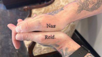 Naz Reid tattoos go viral among Timberwolves fans amid playoff success - ESPN