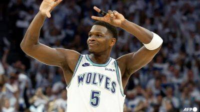 Timberwolves crush Nuggets to stay alive in NBA playoffs