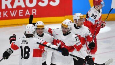Sweden beats Latvia, Switzerland routs Denmark at men's hockey world championship