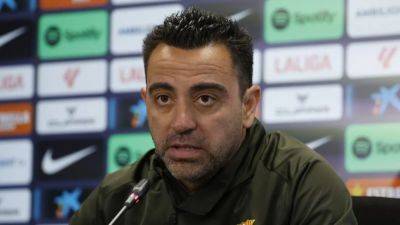 Under-pressure Xavi says he still has Barca's trust