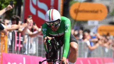 Tadej Pogacar - Filippo Ganna - Ganna gets time-trial revenge on Pogacar to win Giro stage 14 - channelnewsasia.com - Italy - Uae - Slovenia