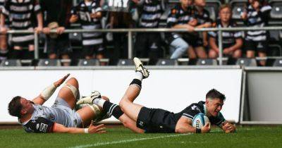 Ospreys keep play-off hopes alive with hard-fought Dragons win