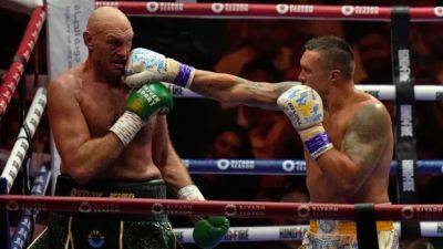 Usyk beats Fury by split decision to become 1st undisputed heavyweight champ in 24 years