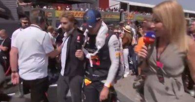 Max Verstappen left stunned as TV reporter is dramatically removed from F1 grid during pre-race interview