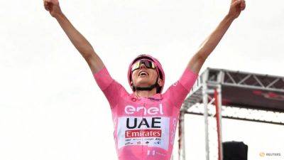 Pogacar leaves chasing pack behind on climb to win Giro stage 15