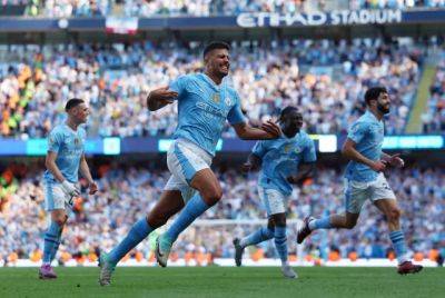 Man City win historic fourth straight English Premier League title
