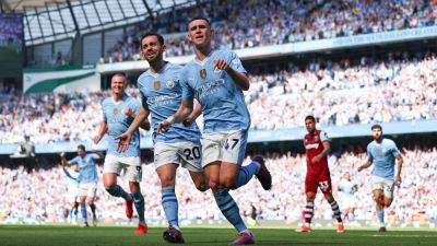 Phil Foden strikes twice as Manchester City defend Premier League crown