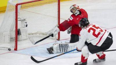 Cozens leads Canada to 3-2 win over Switzerland at world hockey championship
