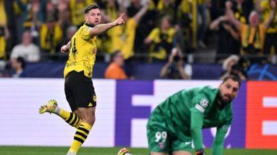 Borussia Dortmund edge profligate Paris Saint-Germain in Champions League semi-final first leg