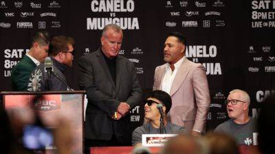 Tensions erupt between Canelo Alvarez, Oscar De La Hoya at presser - ESPN