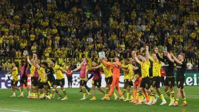 Bundesliga pressure off Dortmund after win over PSG