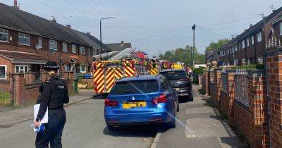 LIVE: Large emergency response and road closed off after house fire - manchestereveningnews.co.uk