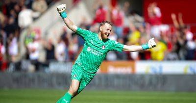 Rotherham keeper Viktor Johansson getting the pints in for fans as thanks ahead of final game