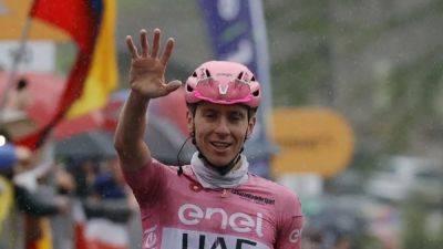 Pogacar powers to win number five in weather-hit Giro stage