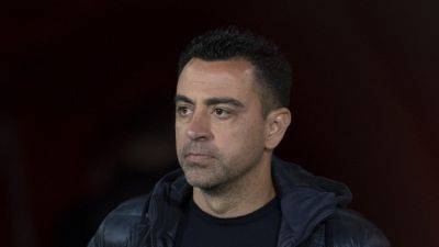 Joan Laporta - Xavi Hernandez - Hansi Flick - Barcelona Sack Club Legend Xavi Hernandez After Trophyless Season - sports.ndtv.com - Germany - Spain