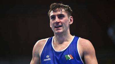 Aidan Walsh keeps Olympic dream alive in Bangkok