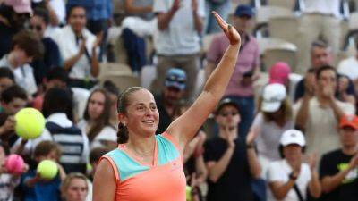 Ostapenko battles past Cristian in French Open first round
