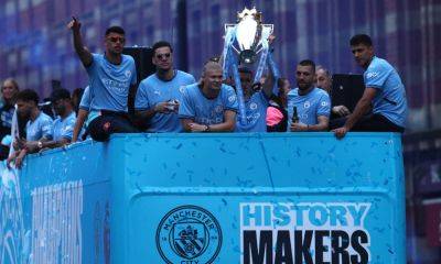 Guardiola vows FA Cup revenge as Man City celebrate title triumph