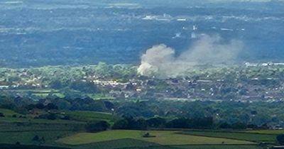 Smoke seen for miles as fire crews tackle blaze in Stockport - manchestereveningnews.co.uk