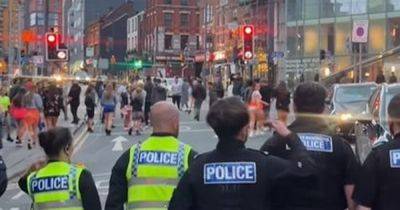 Moment teenagers become involved in huge brawl at the Printworks in scenes of chaos as police swarm area
