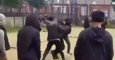Moment 'large-scale' fight breaks out in Oldham before boy, 16, left seriously injured