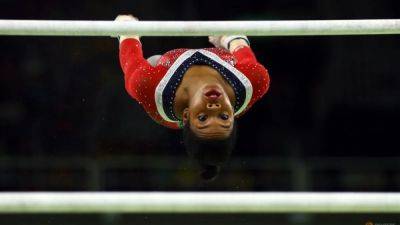 Gymnastics-Douglas ends Paris Olympics bid due to ankle injury
