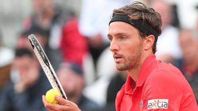 Arthur Rinderknech - Roland Garros - Arthur Rinderknech hurts foot kicking signage at French Open - ESPN - espn.com - France