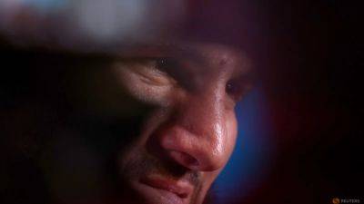 Artur Beterbiev - Beterbiev injury forces postponement of title bout with Bivol - channelnewsasia.com - Russia - China - Saudi Arabia