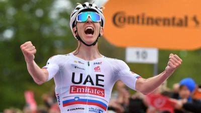 Tadej Pogacar - Ineos Grenadiers - Geraint Thomas - Team Emirates - Pogacar powers into Maglia Rosa with Giro stage win - channelnewsasia.com - Uae - Slovenia