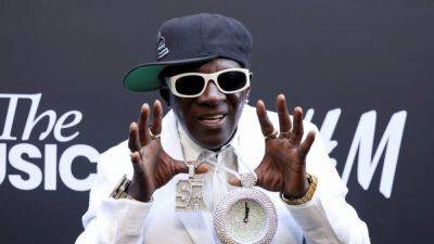Flavor Flav backs US women's water polo team on road to Paris