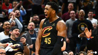 Paolo Banchero - Max Strus - Donovan Mitchell - Evan Mobley - Jarrett Allen - Mitchell rallies Cavs for series-clinching game seven win over Magic - channelnewsasia.com - New York - Los Angeles - county Cleveland - county Mitchell