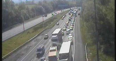 Long queues on M60 motorway with lanes shut after crash