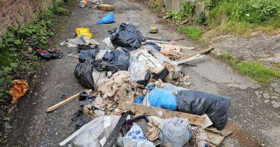 Unadopted road hit by another fly-tip - but a solution might be on the horizon - manchestereveningnews.co.uk