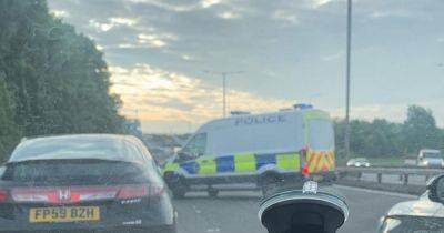Stretch of East Lancs Road closed off with emergency services on scene