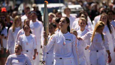 'A way to celebrate Europe': Torchbearers begin Olympic flame's journey across France