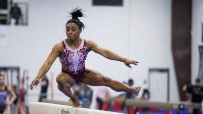 Gymnastics-Biles dominant on first day of US championships