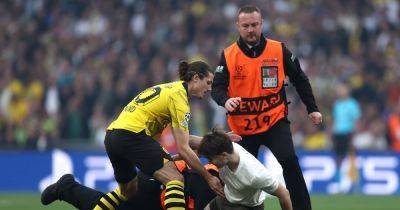 Ex-Man United loanee Marcel Sabitzer takes down pitch invader in Champions League final chaos