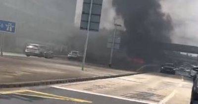 Dramatic moment car becomes engulfed in flames on M56 near Manchester Airport - manchestereveningnews.co.uk